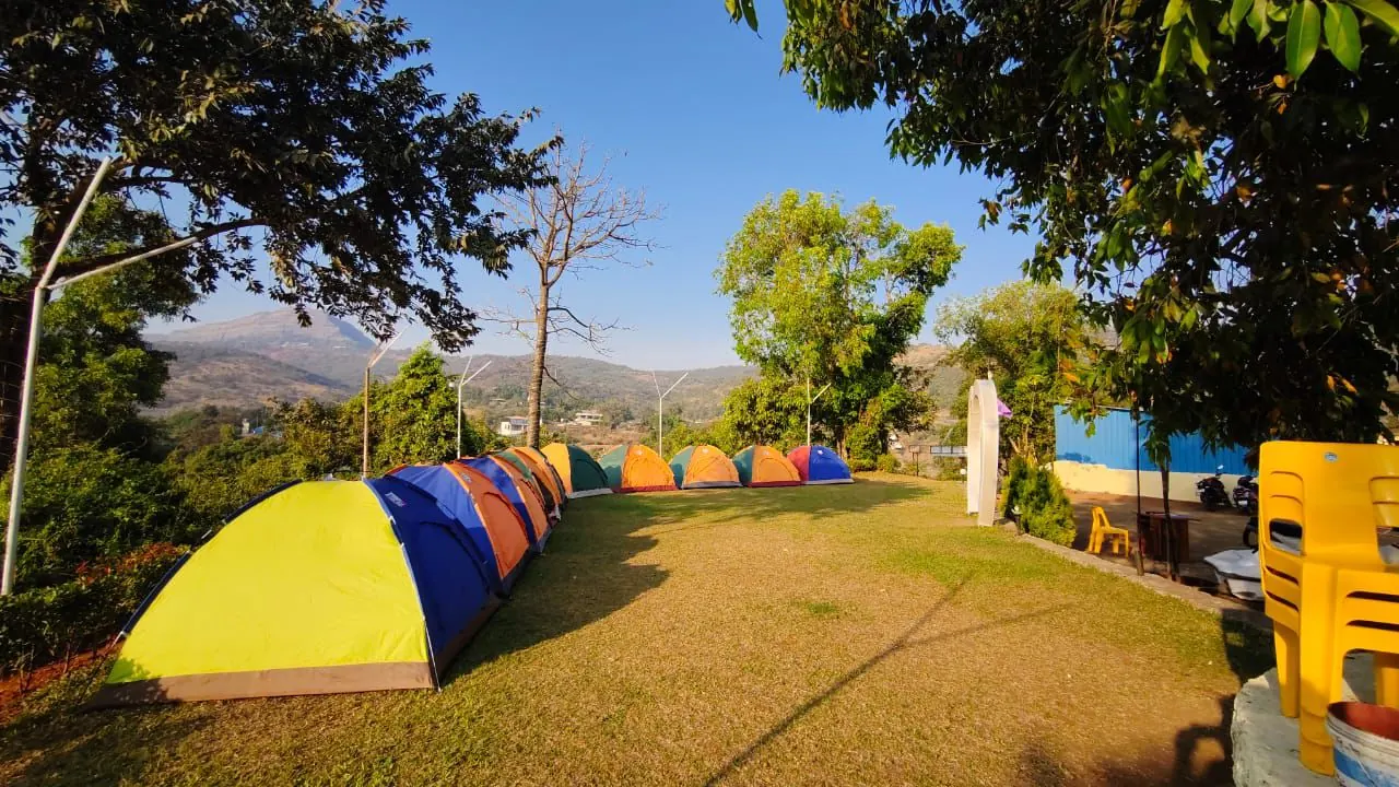 Side view of the tent row with hills behind