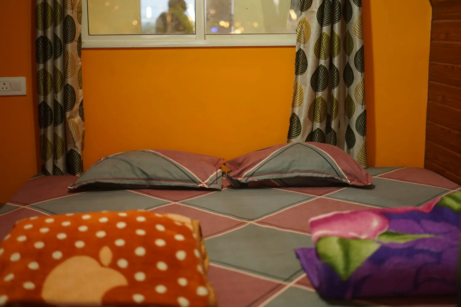 Comfortable double bed inside Pawna Machi cottage