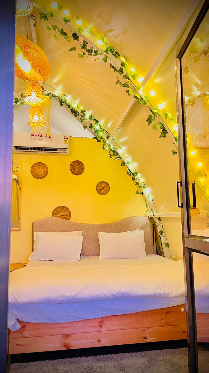 Cottage double bed with wooden frame